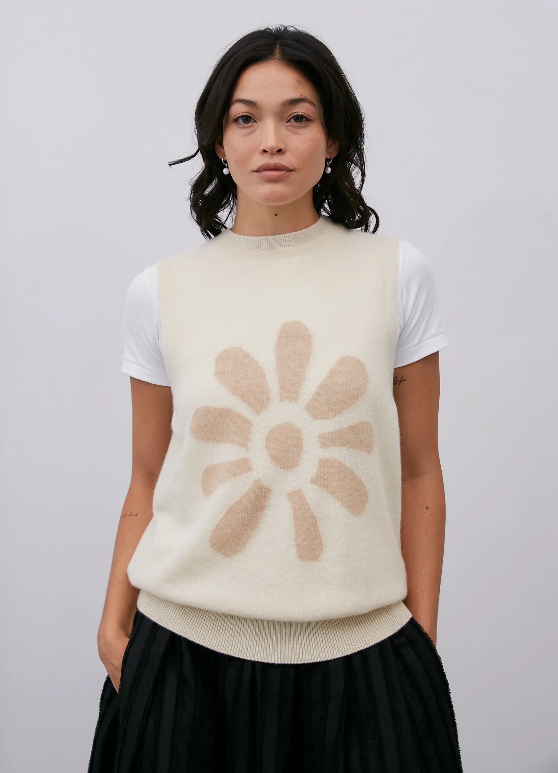 Le mannequin mesure 1m73 et porte une taille XS.